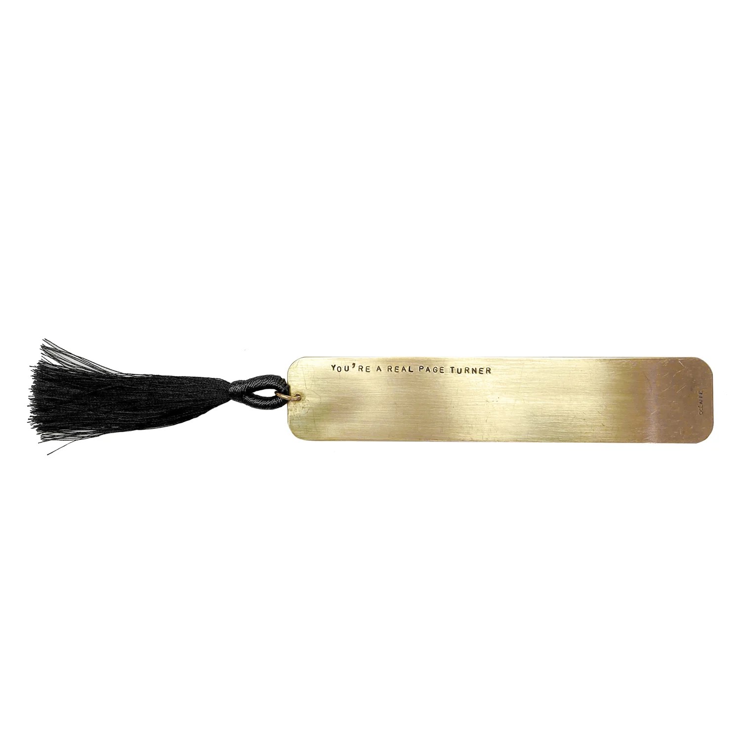 a gold bookmark with a black tassel