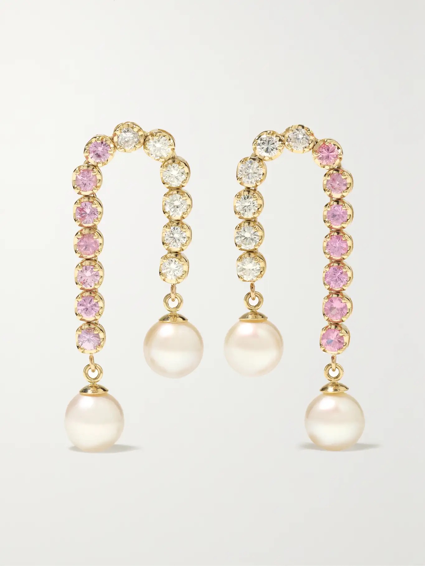 a pair of earrings with pink and white pearls and diamonds